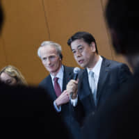 Makoto Uchida, chief executive officer of Nissan Motor Co., speaks alongside Jean-Dominique Senard, chairman of Renault SA, during a news conference in Yokohama on Thursday. | BLOOMBERG
