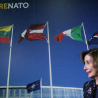U.S. House Speaker Nancy Pelosi leaves after a news conference at NATO headquarters in Brussels Monday. | REUTERS