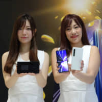 Sharp Corp. unveils its first 5G smartphone model, the Aquos R5G, in Tokyo on Monday. | KAZUAKI NAGATA