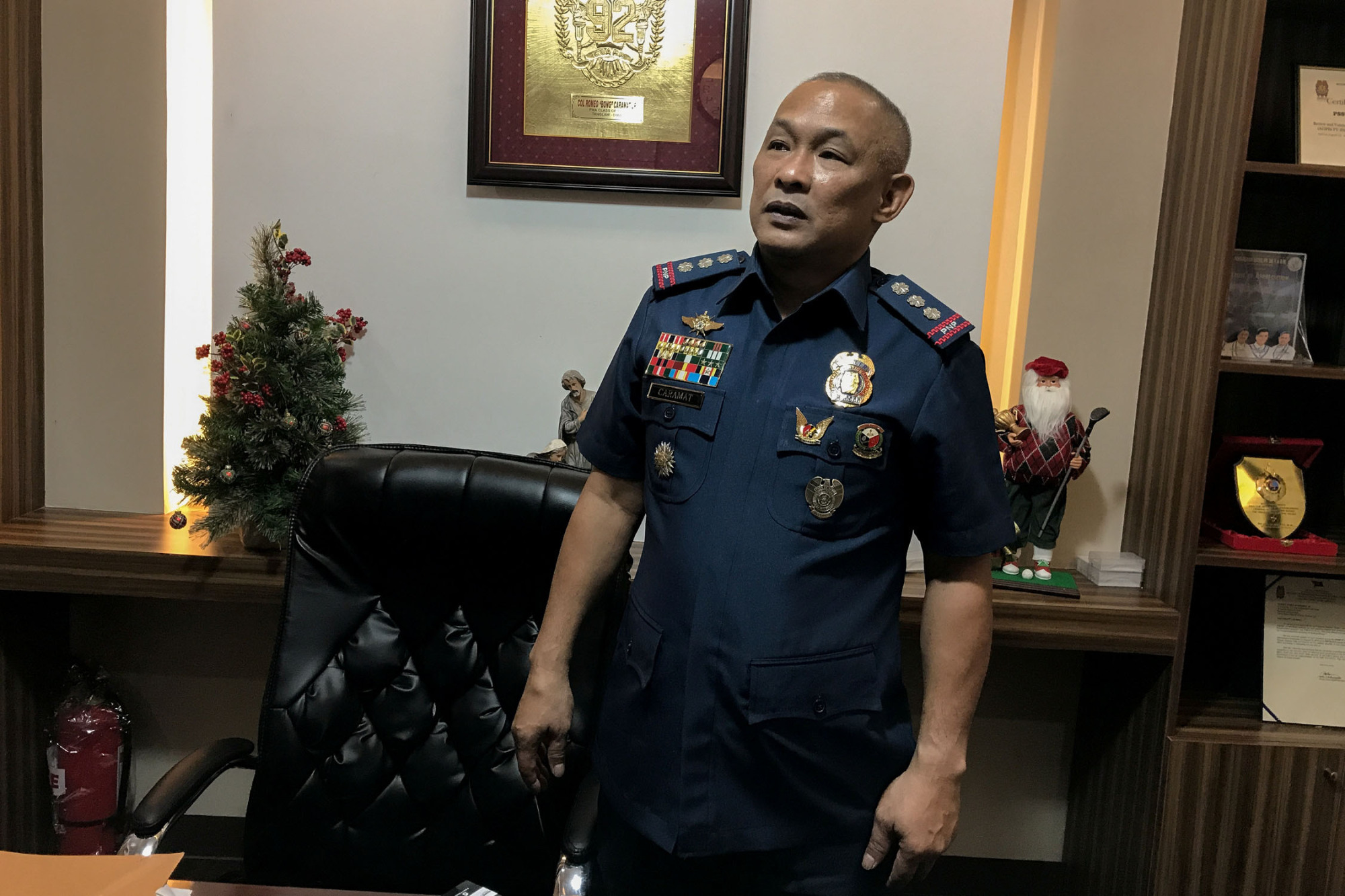Col. Romeo Caramat, chief of the Philippine National Police Drug Enforcement Group, in his office in Manila on Dec. 11. | REUTERS