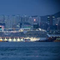The World Dream cruise ship at the Kai Tak terminal in Hong Kong | AFP-JIJI