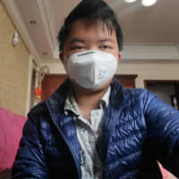 \"Tiger Ye\" at home in Wuhan on Feb. 13 after being discharged from quarantine. | BLOOMBERG