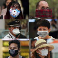 Face masks may be of less benefit if the new coronavirus is additionally being transmitted via the gastrointestinal system. | AP