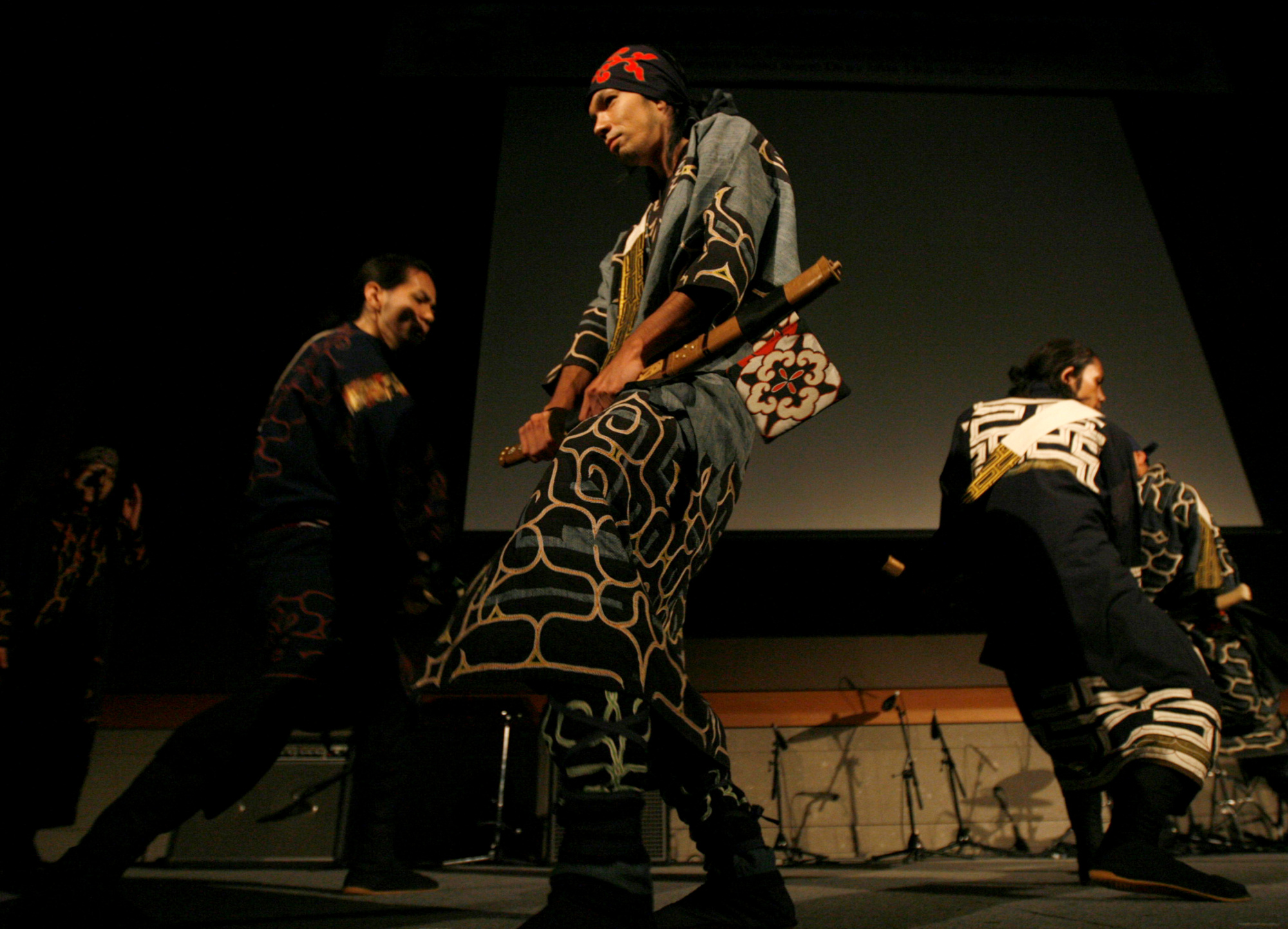 The Ainu Rebels, a performance group mixing traditional Ainu dance and music, dance during the Indigenous Peoples Summit in Sapporo on July 4, 2008, ahead of the G8 Hokkaido Toyako Summit. The Ainu people, a hunting and gathering people thought to be descendants of early inhabitants of Japan who were later displaced mainly to Hokkaido, organized their summit with other indigenous people around the world. | REUTERS