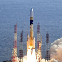 An HII-A rocket carrying a government intelligence-gathering satellite lifts off from the Tanegashima Space Center in Kagoshima Prefecture on Feb. 9. | KYODO