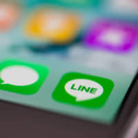 Line Corp. says users of its popular messaging app were hacked this month and that some of them were used for phishing scams. | BLOOMBERG