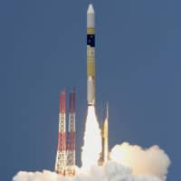An intelligence-gathering satellite is launched on an H2A rocket in June 2018 on Tanegashima island of Kagoshima Prefecture. | KYODO