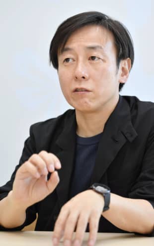 Yoshihisa Aono, president of software development firm Cybozu Inc., is seeking a change to the Family Register Law that would give people in Japan the right to use their premarital surnames upon marriage. | KYODO