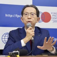 Fukushima Gov. Masao Uchibori speaks about hosting part of the Tokyo 2020 Olympics, at a news conference in Tokyo on Tuesday. | KYODO