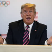 President Donald Trump speaks during a briefing with the U.S. Olympic and Paralympic Committee and Los Angeles 2028 organizers on Feb. 18 in Beverly Hills, California. | AP