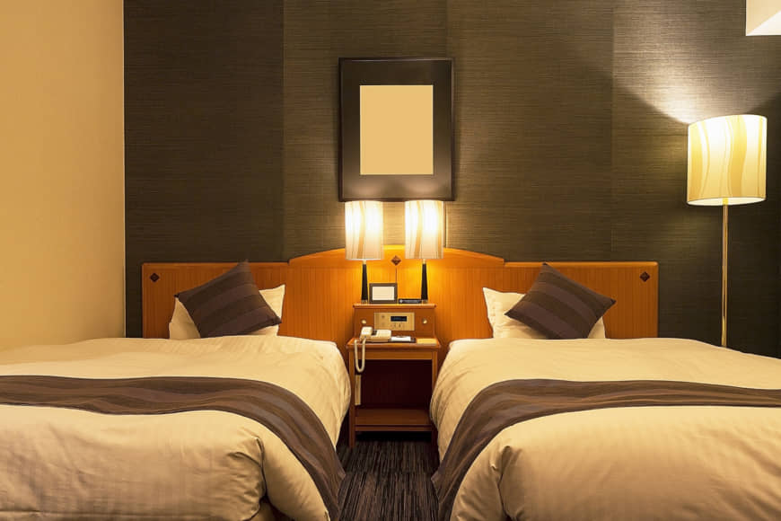 Ready to hit the hay: Your bed awaits, you may just need to produce some identifying documents first. | GETTY IMAGES
