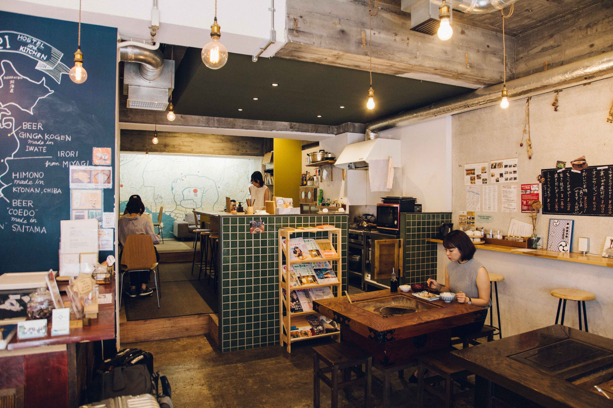 Gather 'round the kitchen: Rustic interiors at Irori Hostel and Kitchen create a homely feel. | COURTESY OF IRORI HOSTEL AND KITCHEN