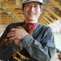 All smiles: Riichiro Ohara took over his father\'s farm in 1994 and quickly committed to farming only free-range chickens. | COURTESY OF OENOSATO NATURAL FARM