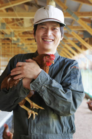 All smiles: Riichiro Ohara took over his father's farm in 1994 and quickly committed to farming only free-range chickens. | COURTESY OF OENOSATO NATURAL FARM