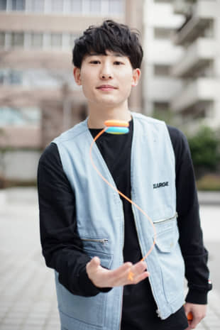 Spinning around: Takada mixes acrobatics with his yo-yo tricks, training in a judo dojo in order to perfect his flips and jumps. | RYUSEI TAKAHASHI