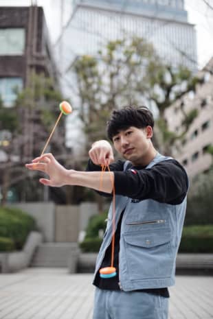 Up and down: Shu Takada credits the yo-yo with saving him from stage fright and helping him make friends overseas. | RYUSEI TAKAHASHI
