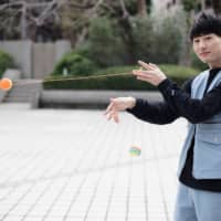 Double trouble: Shu Takada is a six-time world champion, having competed in a category for two-hand yo-yo tricks. | RYUSEI TAKAHASHI