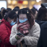 Facebook says it’s working to help limit the spread of misinformation about the coronavirus by using third-party fact-checkers to review and remove content from Facebook and Instagram that spread fake news about the disease. | AP