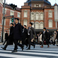 The wages of Japanese workers trail behind the levels in many other major advanced economies. | BLOOMBERG