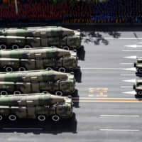 Beijing\'s arsenal of cruise and ballistic missiles puts Japanese and U.S. land bases and naval forces at risk. | JHPHOTO &#8212; IMAGINECHINA