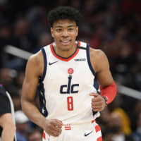 Wizards forward Rui Hachimura runs down the court during the first half of an NBA game against the Memphis Grizzlies on Sunday in Washington. | AP