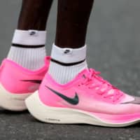 An athlete wears Nike\'s Vaporfly shoes at the Dubai Marathon on Jan. 24. | REUTERS