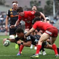 The Chiefs\' Quinn Tupaea scores a try against the Sunwolves in a Super Rugby match on Saturday at Prince Chichibu Memorial Rugby Ground. The Chiefs beat the Sunwolves 43-17. | AFP-JIJI