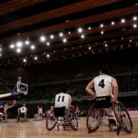 Members of Japan\'s national wheelchair basketball team participate in a demonstration match at Tokyo\'s Ariake Arena on Sunday. | REUTERS