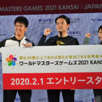 (From left) Special Ambassador So Takei with Ambassadors Taizo Sugimura and Nagano Olympic speed skating bronze medalist Tomomi Okazaki during a photo session after the press conference at a \"World Masters Games 2021 Kansai\'\' promotional event on Feb. 1. | YOSHIAKI MIURA