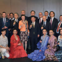European Union Ambassador to Japan Patricia Flor (center row, eighth from left) with Foreign Minister Toshimitsu Motegi (ninth from left) and Chairman of the Japan-EU Parliamentary Friendship LeagueNobuteru Ishihara (seventh from left), as they pose for photos with ambassadors of EU member states in Japan, and members of the Tomoko Ishii Spanish Dance Company to mark the 1st anniversary of the entry into force of the EU-Japan Economic Partnership Agreement at the Delegation of the EU to Japan’s Europa House on Feb. 4. | YOSHIAKI MIURA