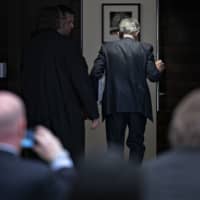 Jerome Powell, chairman of the U.S. Federal Reserve, exits after a news conference following the Federal Open Market Committee meeting in Washington in January. | BLOOMBERG