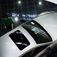 Sales of new Toyota cars, including Lexus models, in China plunged 70 percent in February from a year earlier. | BLOOMBERG