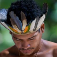 An indigenous man from the Pataxo ethnic group in the village of Nao Xoha, in Brazil\'s Minas Gerais state, on Wednesday | REUTERS