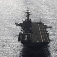 The USS Boxer sails in the Arabian Sea off Oman last July. | REUTERS