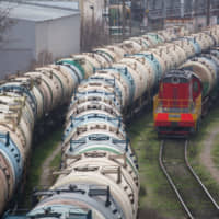 Rail cars for transporting oil at the RN-Tuapsinsky refinery, operated by the Rosneft Oil Co., in Tuapse, Russia, on Monday | BLOOMBERG