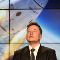 SpaceX founder Elon Musk attends a post-launch news conference to discuss the SpaceX Crew Dragon astronaut capsule in-flight abort test at the Kennedy Space Center in Cape Canaveral, Florida, on Jan. 19. | REUTERS