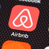 When a Toronto family canceled a trip to Japan due to the coronavirus outbreak, they received a refund from their hotels and a voucher from the airline. Airbnb Inc. said no. | PHOTOGRAPHER: CARL COURT/GETTY I