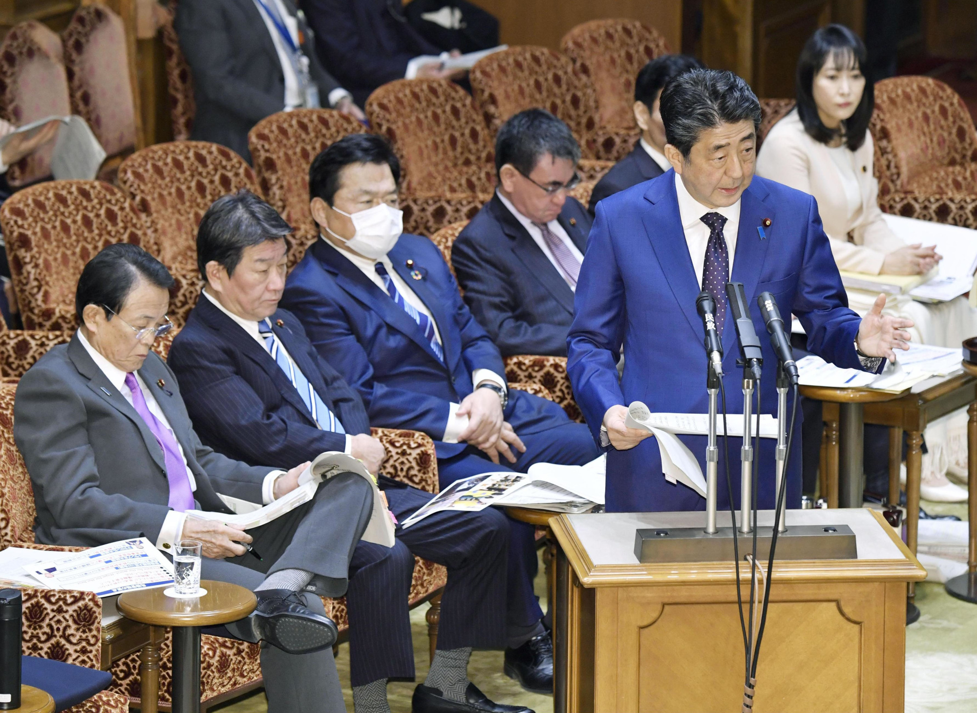 Prime Minister Shinzo Abe speaks during a session of the Upper House Budget Committee on Monday. | KYODO