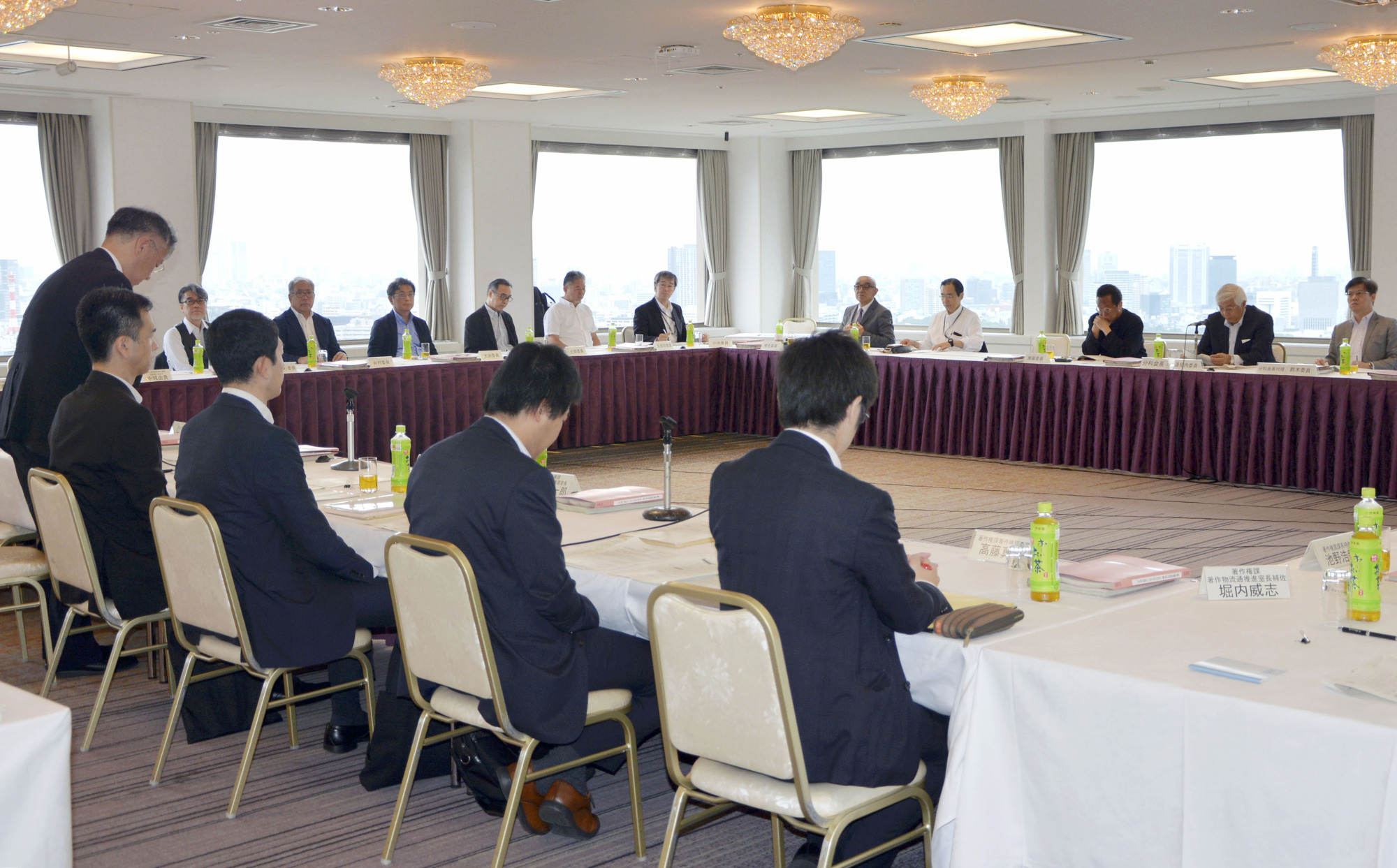 Members of a government panel gather in July 2019 in Tokyo to discuss amending the Copyright Act. | KYODO
