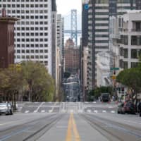 An empty street is shown during rush hour in San Francisco last week. | BLOOMBERG