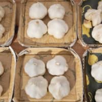 Gigantic garlic: Sold at Farmers Market @UNU, these garlic bulbs hail from Tokiwa, Aomori Prefecture. “This is the best garlic in Japan,” declares Seiko Sasamori, whose family grows them on their farm, Sasamori Noen. | ATSUMI FASHION CO.