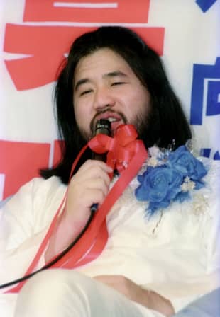 Shoko Asahara, then head of the Aum Shinrikyo cult, in 1990. | KYODO 