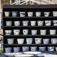 Blue and white: At the Oedo Antique Market, Masayuki Fukuda, owner of an antique shop in Nikko, Tochigi Prefecture, specializes in top-quality Ko-Imari and Ko-Kutani ceramic ware.