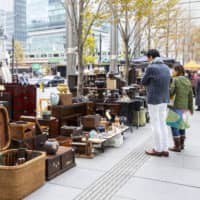 Street fair: The sidewalk lineup at the International Forum market of Korokuten features shops specializing in vintage Japanese furniture.