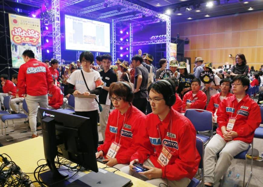 Gamers play Puyo Puyo, a tile-matching video game, at a national esports competition in Ibaraki Prefecture last October. | KYODO