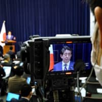 A camera captures Prime Minister Shinzo Abe speaking at a news conference in Tokyo on Saturday.
 | AFP-JIJI