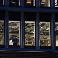 Most employers guarantee in work regulations that employees working full time receive 100 percent of earnings, but nonregular workers don’t benefit from such clauses. | BLOOMBERG