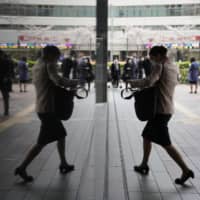 With COVID-19 yet to be contained, nonregular workers who don’t have much paid leave may need to stay at home without pay. | BLOOMBERG