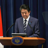 Prime Minister Shinzo Abe holds a news conference on the COVID-19 outbreak at the Prime Minister\'s Office in Tokyo on Saturday. | REUTERS