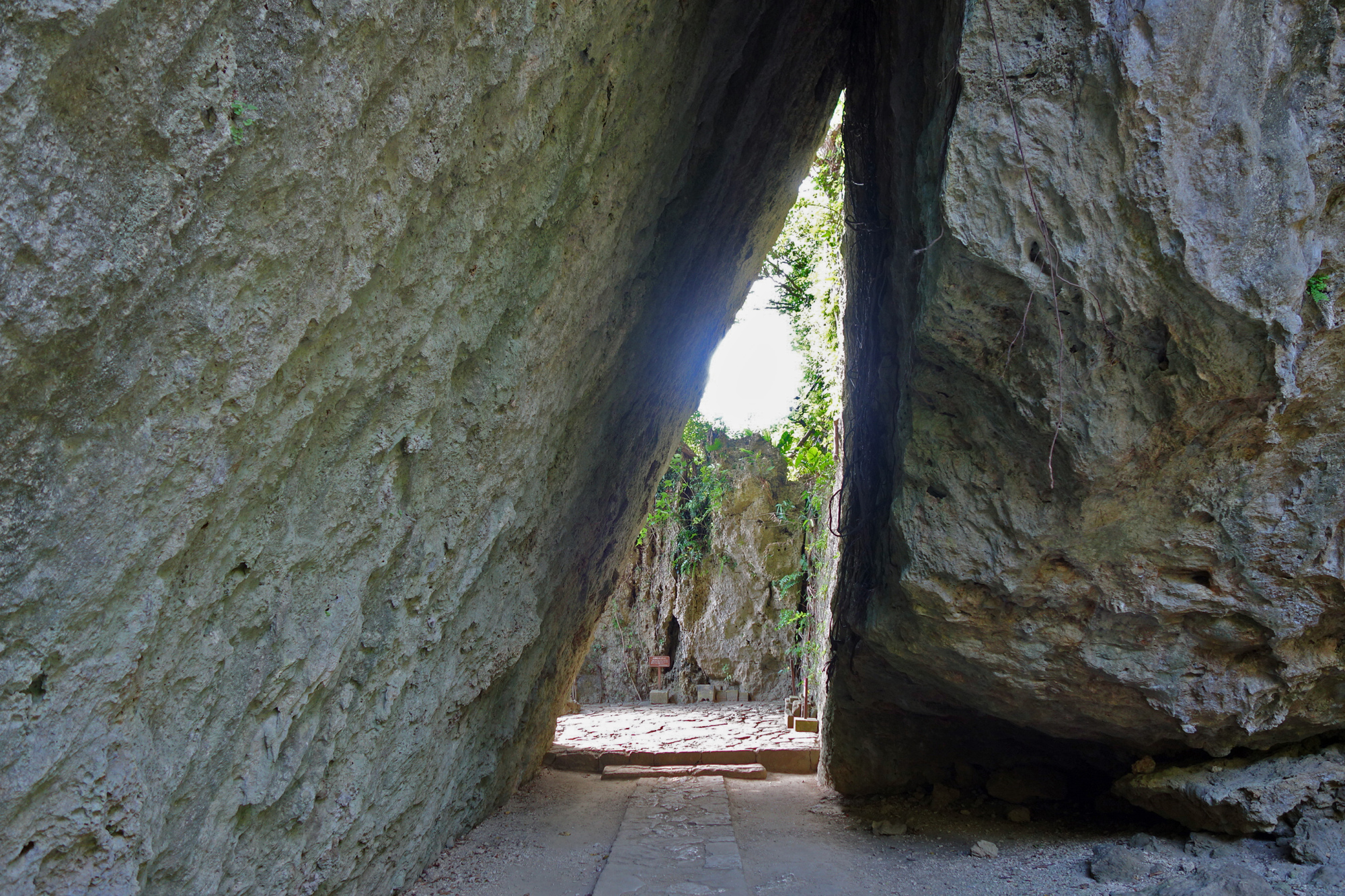 A pilgrimage for kings: The most iconic of Sefa Utaki's ibi (sanctuaries) is Sangui, a triangular tunnel formed between two rock faces. | ALEX MARTIN